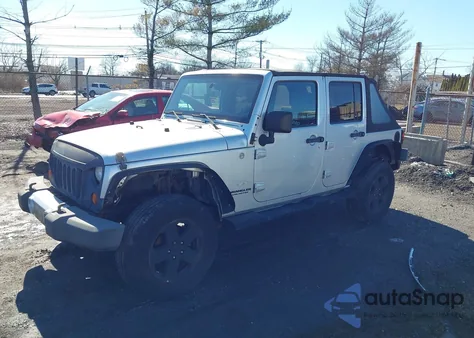 2010 Jeep Wrangler Unlimited Sahara из США, поврежденный, VIN 1J4BA5H10AL110072